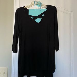 Black top with criss cross in front.